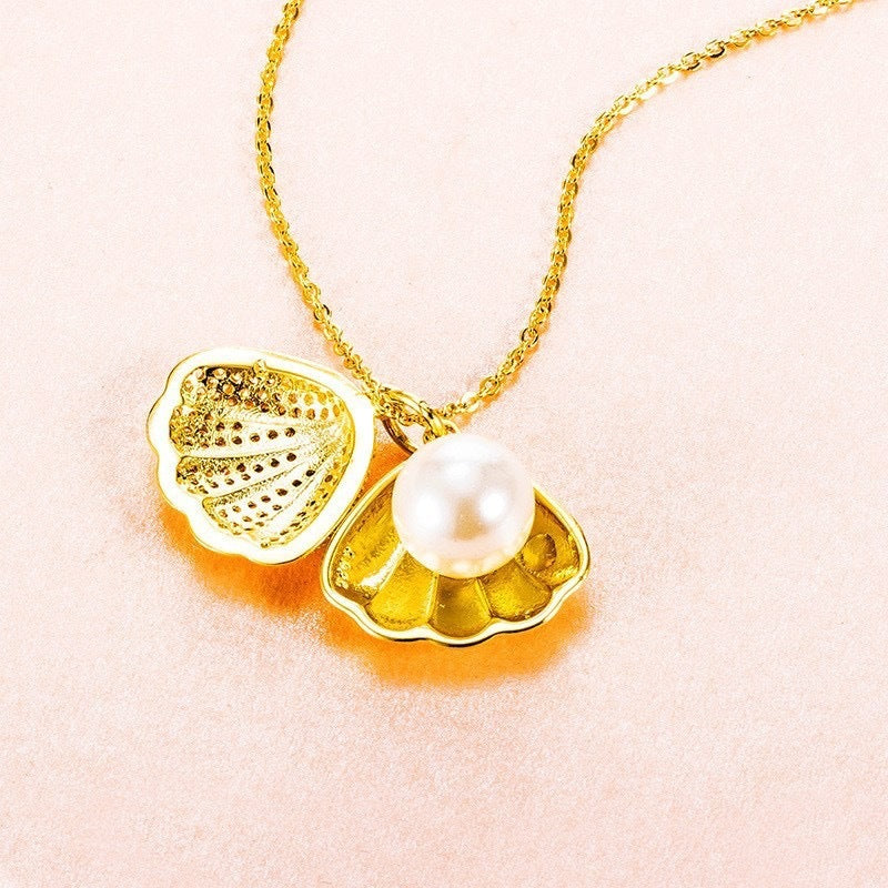 Collana di perle di conchiglia con strass. - Ciondolandia